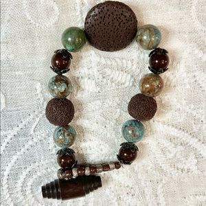 Boho bracelet lava, wood, acrylic, wood toggle closure. Great for stacking